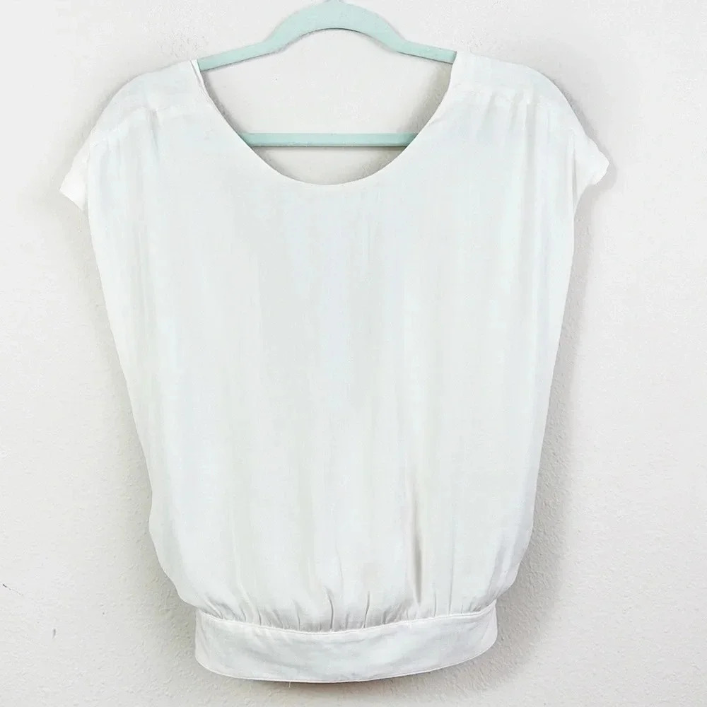 Anthropologie Off White Open Back Top Banded Hem Round Neck Blouse size Small